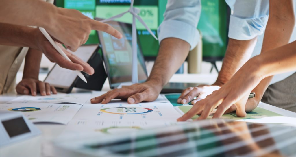 Group of businesspeople in team brainstorm meeting discussion on ESG (Environmental, social, corporate governance) organization planning. Sustainable business, coworker people teamwork. Close up